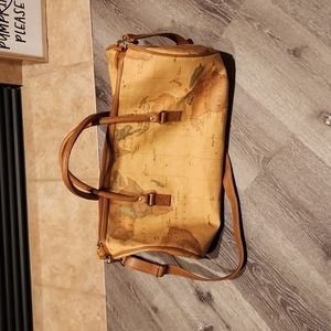 World map duffle bag. Like new. Never used. 20 inches long & 10 inches wide.